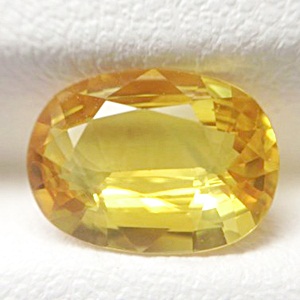 Natural Yellow Sapphire พลอยบุษราคัมบางกะจะ รูปไข่ หนัก 2.08 กะรัต สีมะนาวทอง จัดว่าสีสวย ความสะอาดมองตาเปล่าไม่มีตำหนิ ส่องด้วยกล้องขยายสะอาด 99%