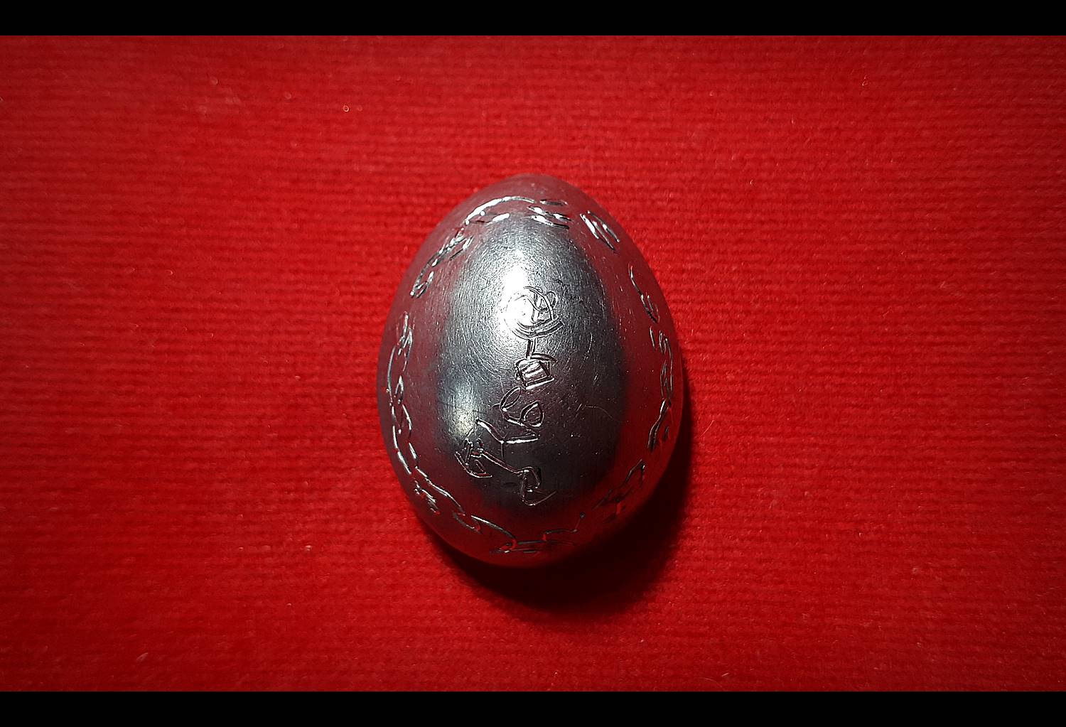 เบี้ยแก้ (เบี้ยหุ้มด้วยแผ่นตะกั่วจารเขียนอักขระด้วยมือท่านเอง) - หลวงพ่อตี๋ วัดหูช้าง (ตอกโค๊ต ต.ใบโพ และ โชคดี)