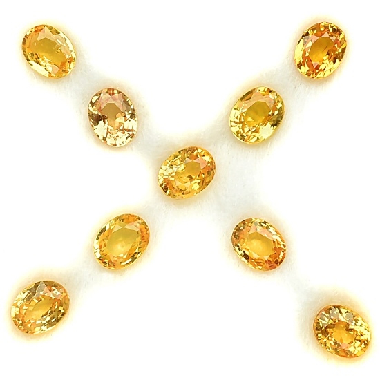 Yellow Sapphire พลอยบุศราคัมเนื้อแข็ง จัดเซท รูปไข่ขนาด 4.5x3.5 มิล จำนวน 9 เม็ด น้ำหนักรวม 3.23 กะรัต สีเหลืองทอง