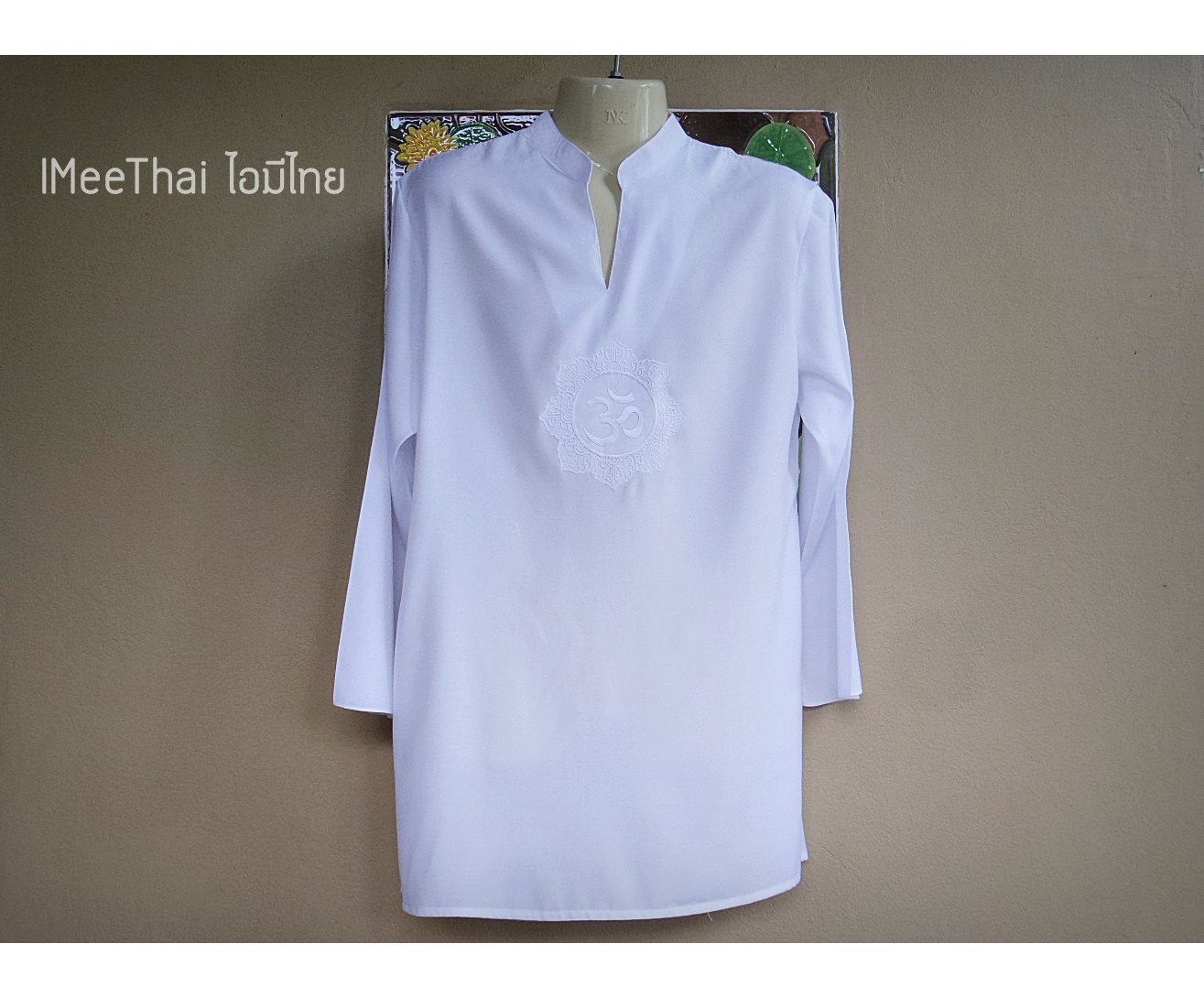 เสื้อขาว อักษรขาว โอมพระพิฆเนศ