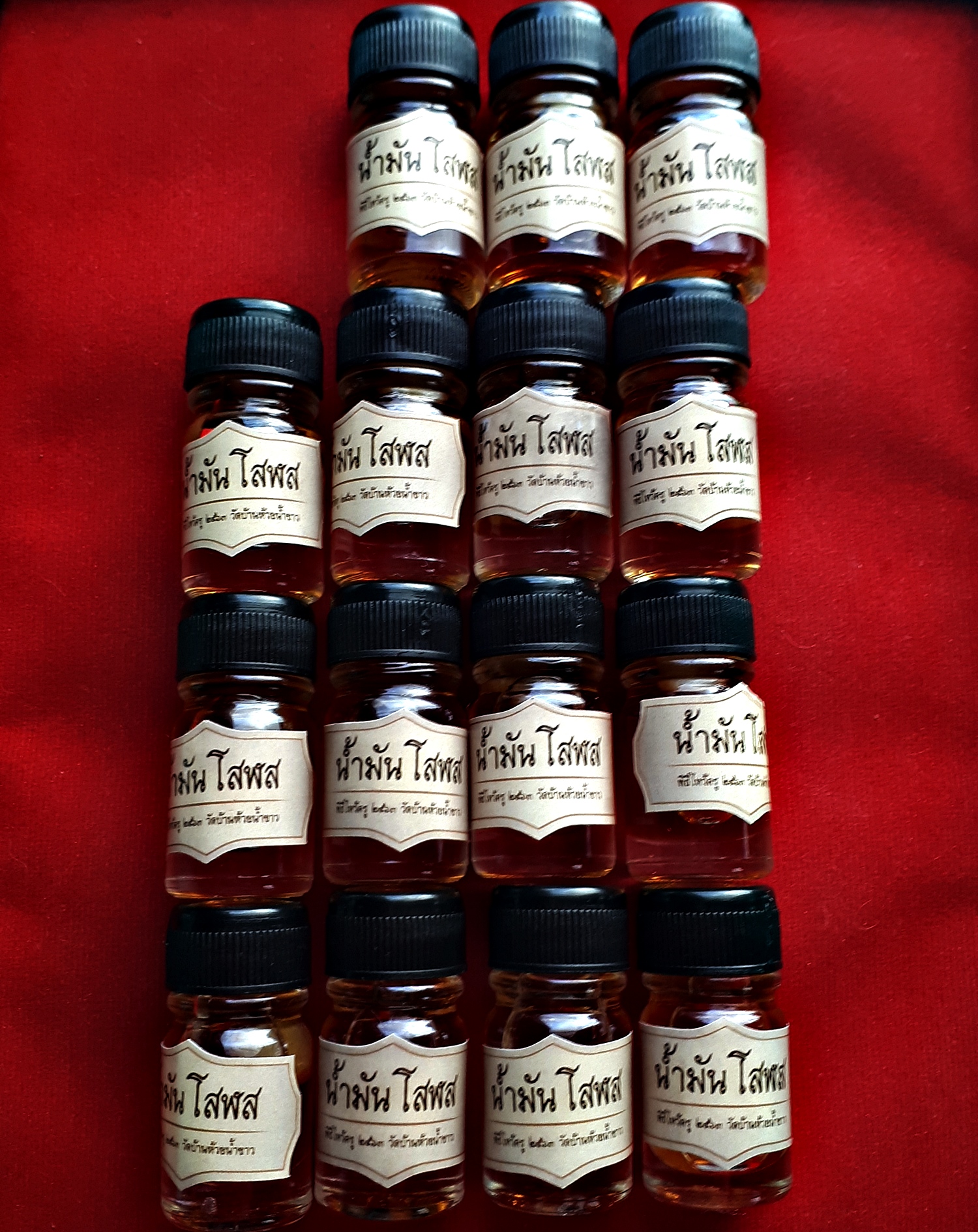 น้ำมันโสฬส (ในขวดแช่บรรจุ ลูกอมเทียนชัย) #รับประกันแท้ - หลวงพ่อเล็ก วัดท่าขนุน (ปลุกเสก ปี2563 ณ วัดห้วยน้ำขาว)