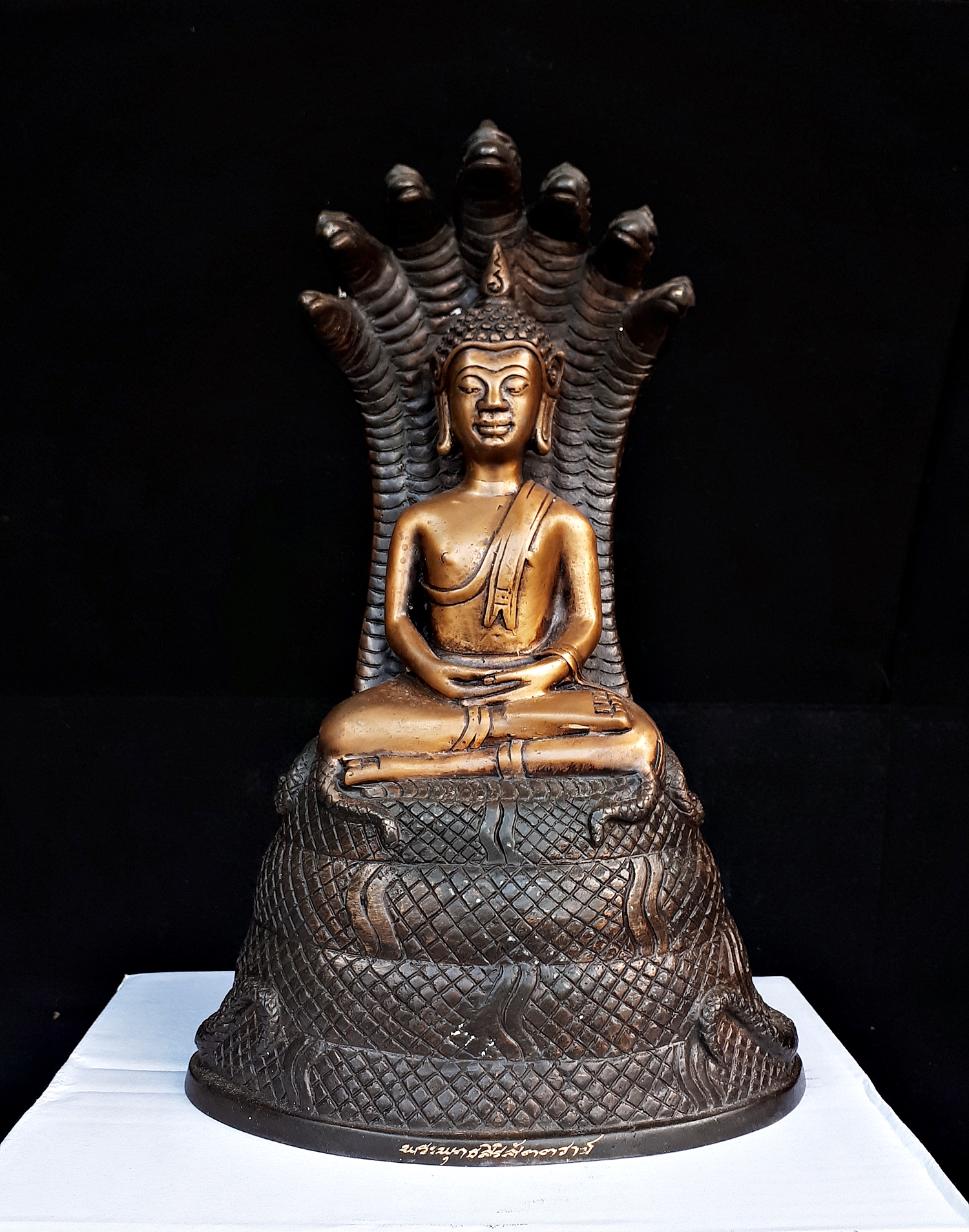 หลวงพ่อเจ็ดกษัตริย์ พระพุทธสิริสัตตราช ( พระบูชา ปางพระนาคปรก ขนาดหน้าตัก 4นิ้ว เนื้อโลหะชนวน รมดำ )