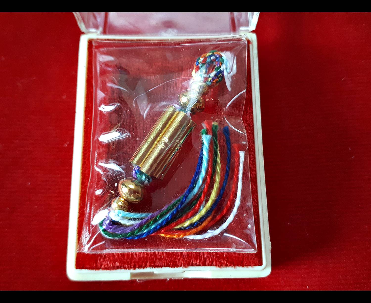 ตะกรุดกำลังแม่พระธรณี ด้าย7สี เนื้อทองคำแท้ (ทองคำ7ดอก ลงอักขระ) ( #เมตตามหาเสน่ห์ทองคำ #มหาลาภทองคำ) ปี2557 #รับประกันแท้ - หลวงพ่อเล็ก วัดท่าขนุน