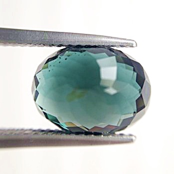 Natural Tourmaline พลอยทัวมารีน รูปไข่ หนัก 4.36 กะรัต สีเขียวเข้ม ความสะอาดมองตาเปล่าสะอาดไม่มีตำหนิ ส่องด้วยกล้องขยายสะอาด 98%