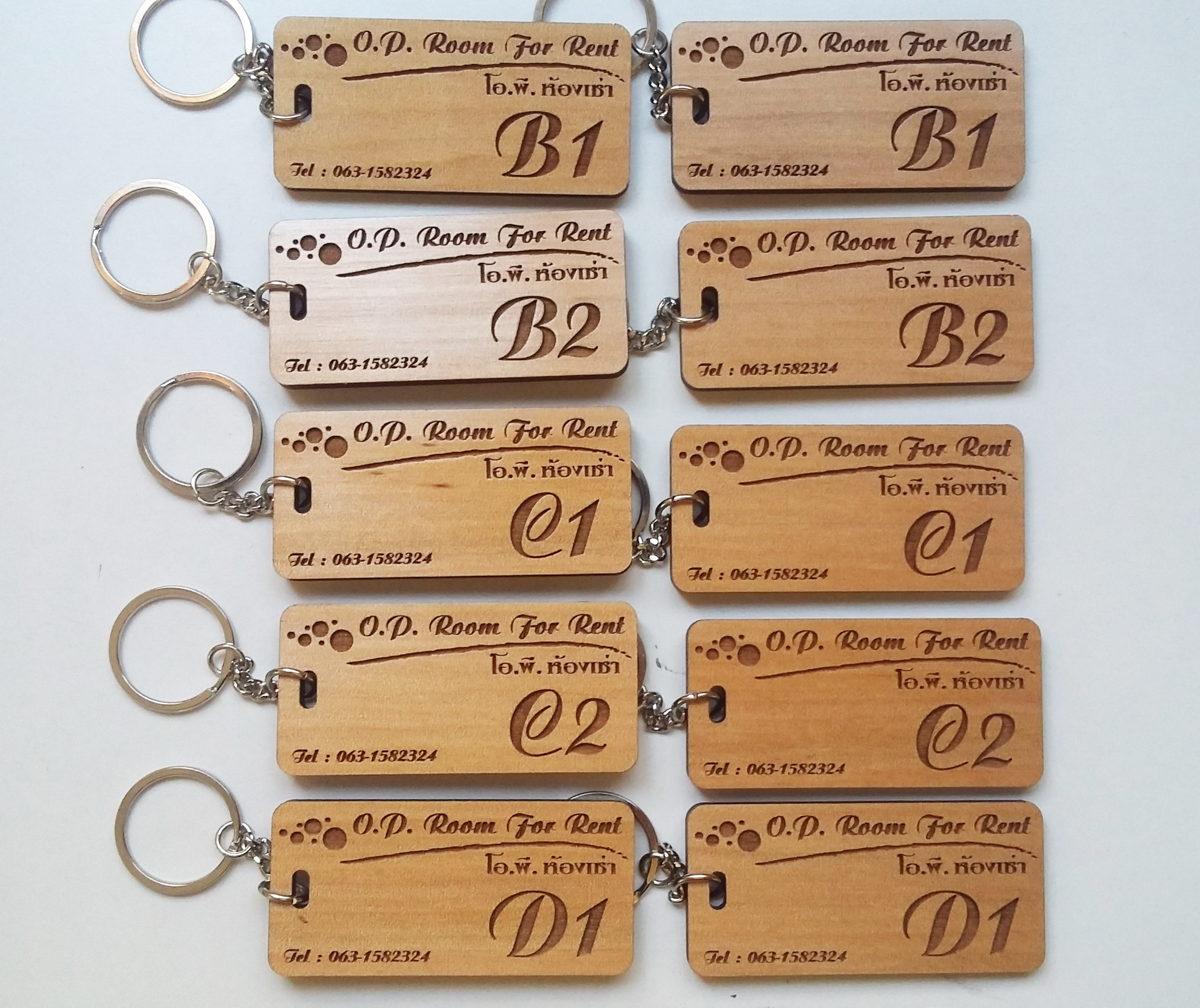 พวงกุญแจไม้ พวงกุญแจห้องพัก - O.P. Room For Rent Pattaya
