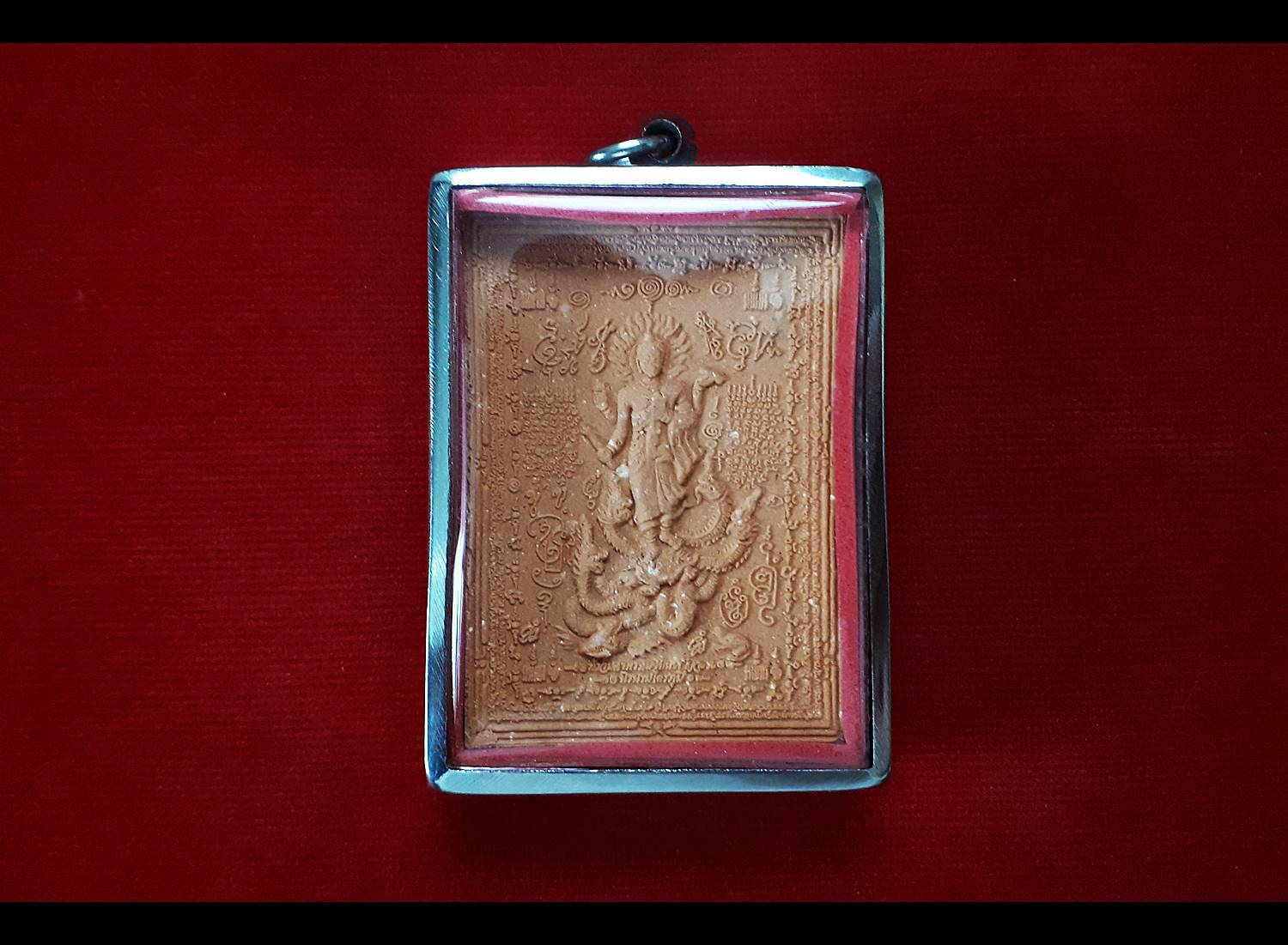 เหรียญ อาจารย์หม่อม นิรนามไตรภูมิ(หน้าอาจารย์ตอนท่านบวช) หลัง ท้าวมหาพรหมชินบัญชร (สีส้ม เนื้อผงฝั่งเหล็กไหล มวลสาร เกศา สมิงเหล็กไหล ผงอื่นๆ)