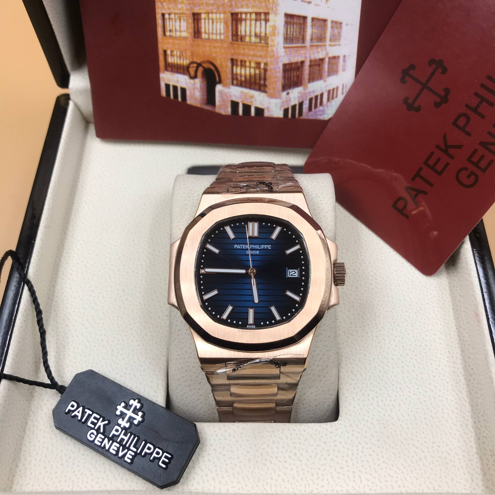 นาฬิกา Patek Philippe รุ่น Nautilus งาน Mirror Swiss สาย Stainless Steel สี Pink Gold หน้าปัดสีน้ำเงิน