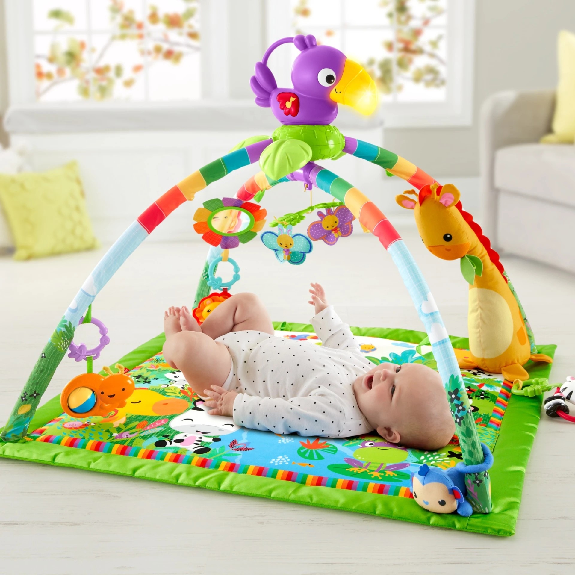 เพลย์ยิมเสริมพัฒนาการ Fisher-Price Rainforest Music & Lights Deluxe Gym