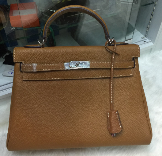 กระเป๋า hm kelly togo leather 32 cm สีน้ำตาล สีอื่นๆเพิ่มเติมสอบถามได้ค่ะ สต็อคเปลี่ยนตลอด