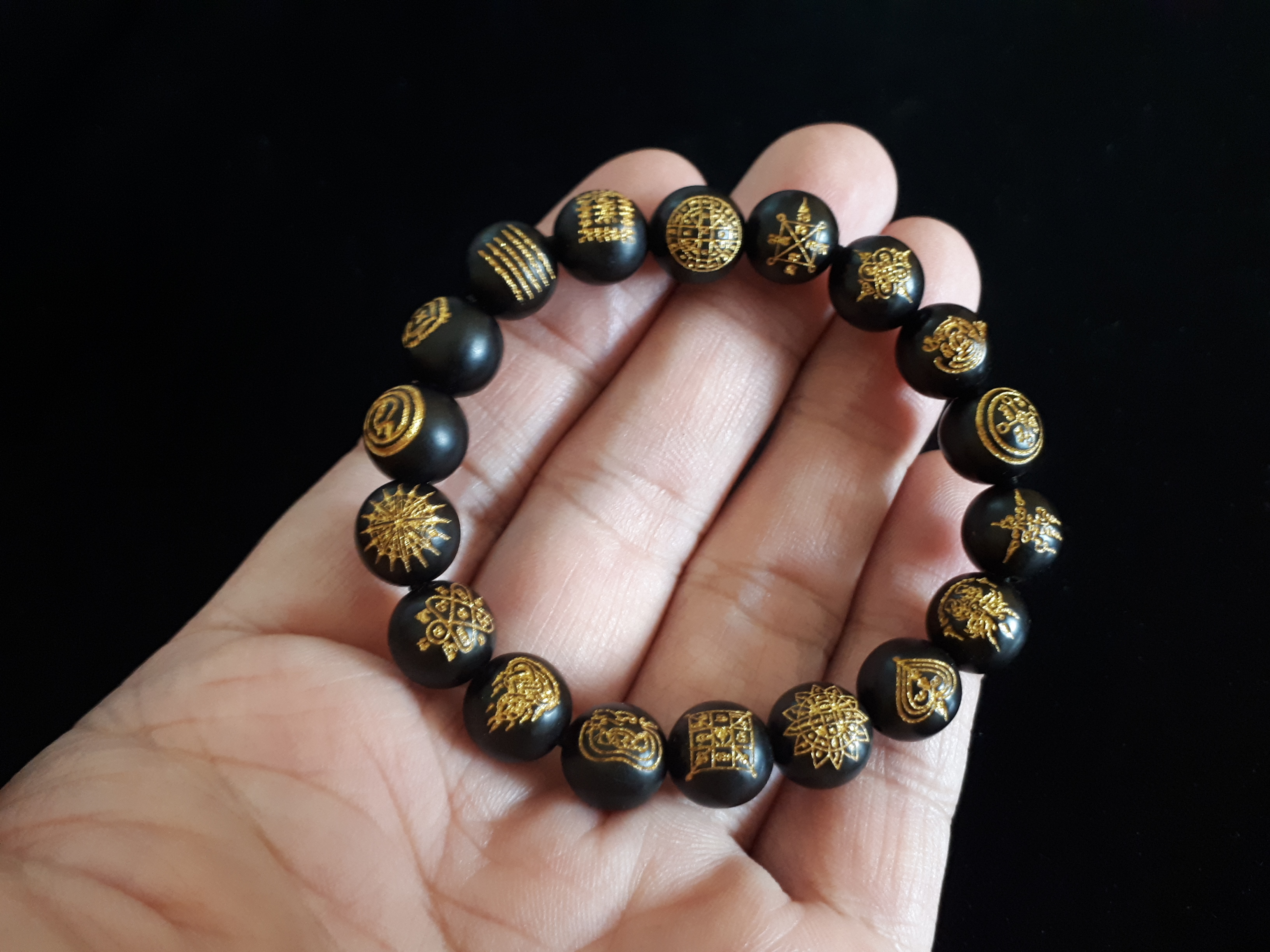 ประคำข้อมือ ไม้พญางิ้วดำแท้ (ยิงต์เลเซอร์ลายยันต์)
