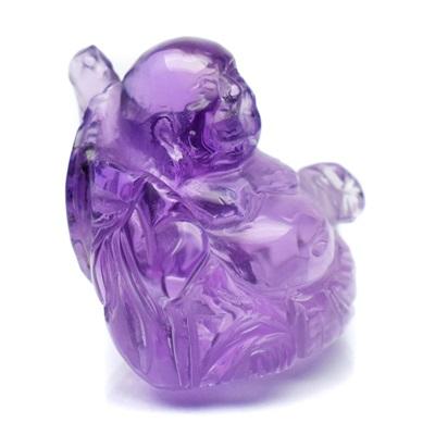 Carving Amethyst พลอยอเมทิสต์แกะสลัก รูปพระสังกัจจายน์ หนัก 54.61 กะรัต สีม่วงโทนหวาน อมชมพู ความสะอาดมีตำหนืภายในเม็ด แต่ชิ้นนี้จัดว่ามีตำหนิน้อยค่