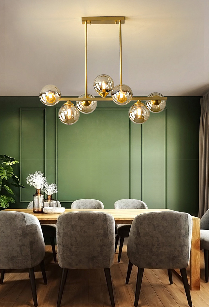 โคมไฟแขวนเพดานสไตล์โมเดิร์นโครงสีทองเหลืองโป๊ะโคมแก้วทรงกลมสีเหลืองใส [JB1438]