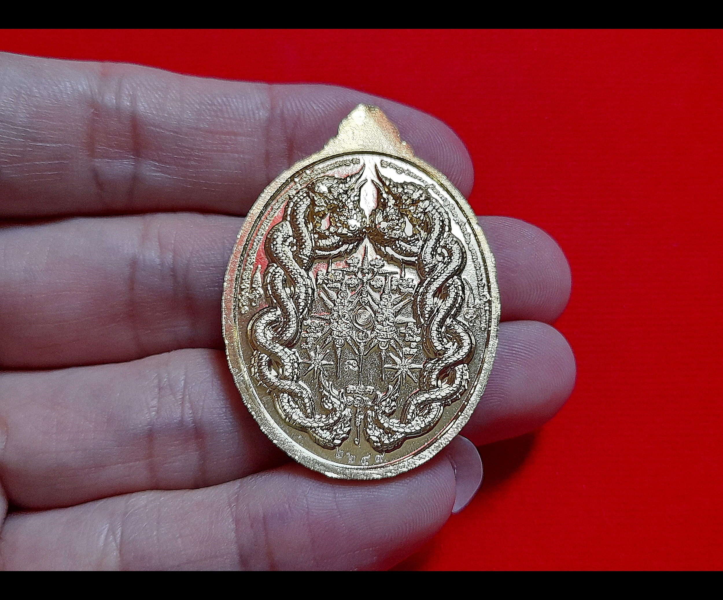 เหรียญ พญานาคราช๙เศียร หลัง นาคเกี้ยว (เก้าอธิบดี พญานาค ทั้ง๙ตระกูล) เนื้อปลอกลูกกระสุนปืน ปี2565 #รับประกันแท้