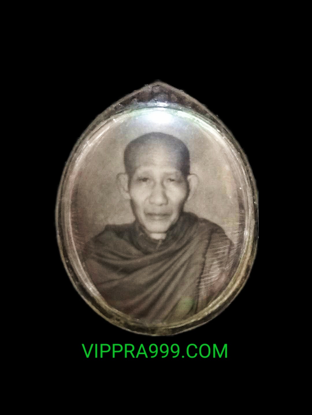 ล็อคเก็ตหลวงพ่อเกษม เขมโก หลังหุ้มแผ่นเงิน ปี35