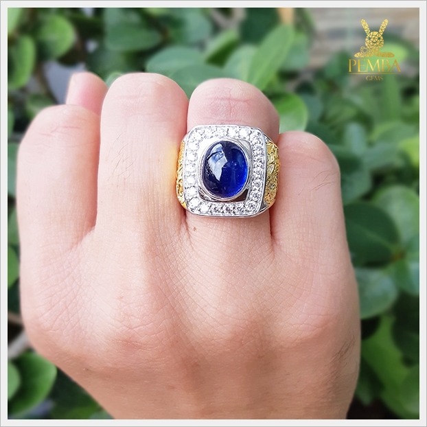 แหวนไพลินแท้ อัญมณีสีน้ำเงินใสงดงาม ทรงหลังเบี้ย ลายมังกรโดดเด่นสะดุดตา