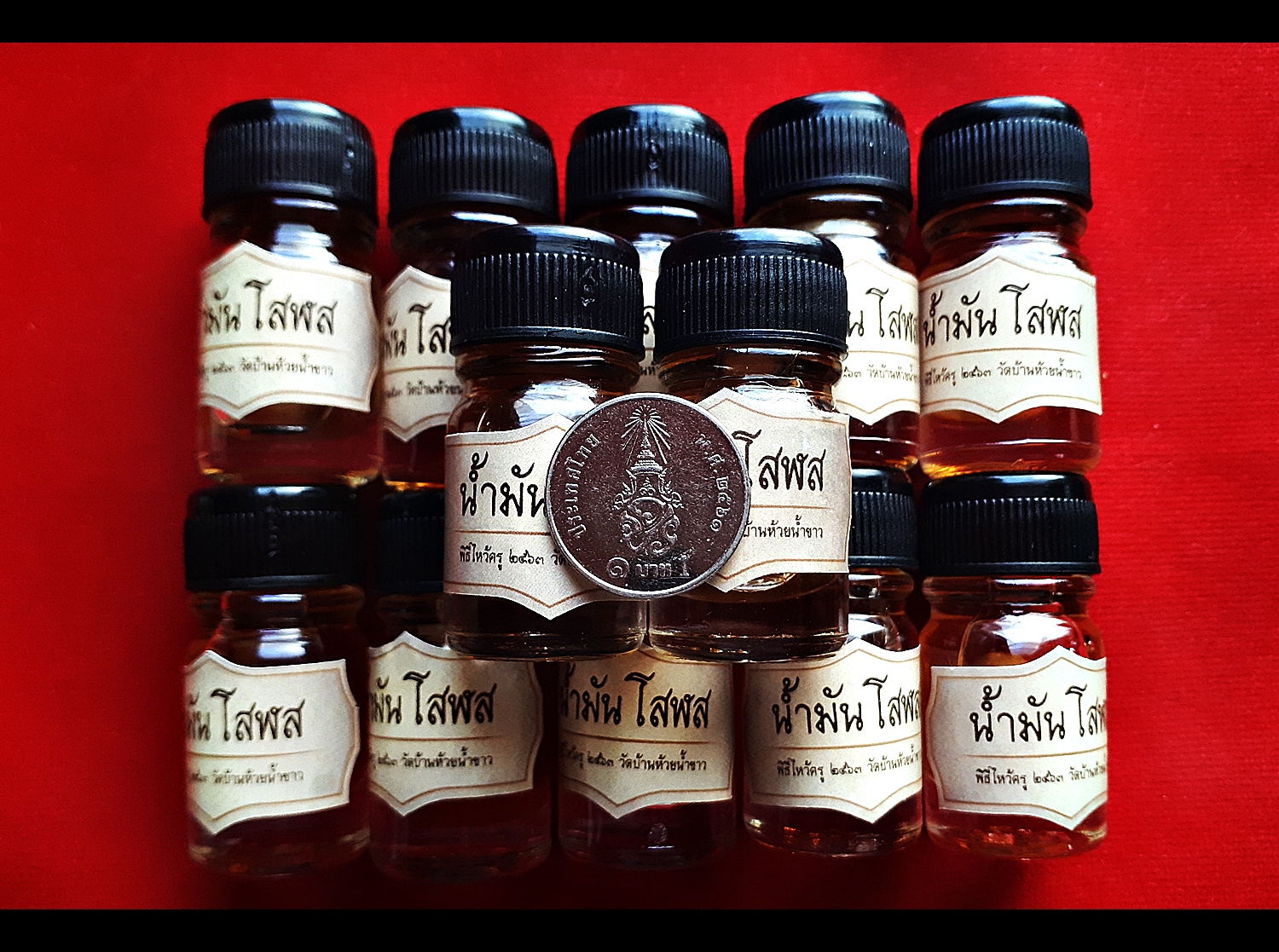 น้ำมันโสฬส (ในขวดแช่บรรจุ ลูกอมเทียนชัย) #รับประกันแท้ - หลวงพ่อเล็ก วัดท่าขนุน (ปลุกเสก ปี2563 ณ วัดห้วยน้ำขาว)