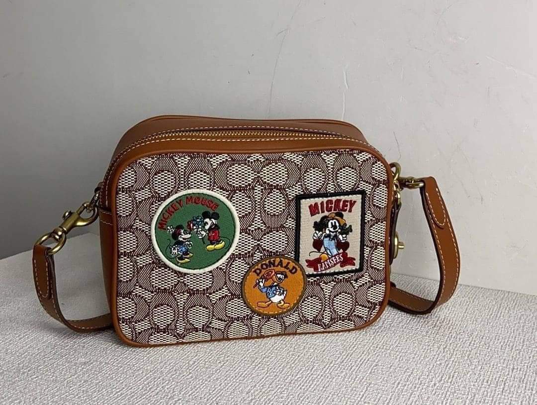 Coach Disney X Coach Flight Bag (แอดไลน์ก่อนสั่งซื้อ)