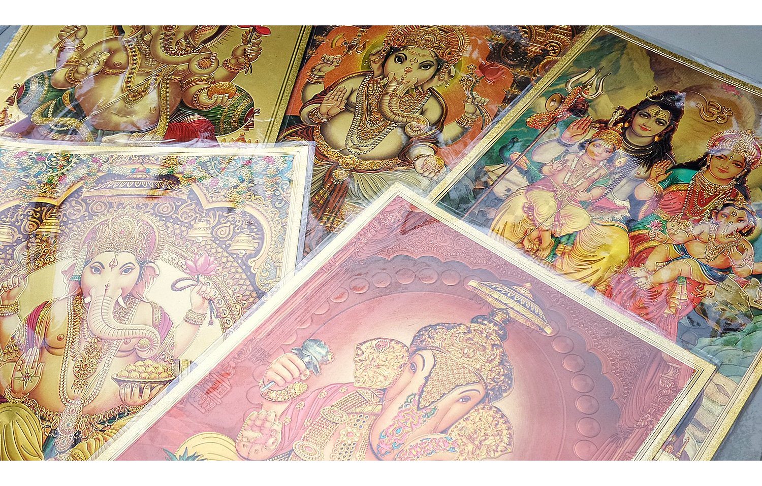 รูปภาพแผ่นทอง พระพิฆเนศ พระศิวะ พระแม่อุมา พระแม่กาลี ปางต่างๆ แผ่นทองพิมพ์ลายนูน 2หน้า (ขายปลีก ขายส่ง)