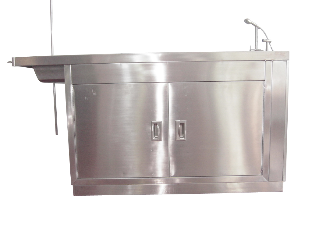 โต๊ะผ่าตัดสแตนเลส พร้อมซิงค์น้ำล้างแผลและตู้เก็บของในตัว