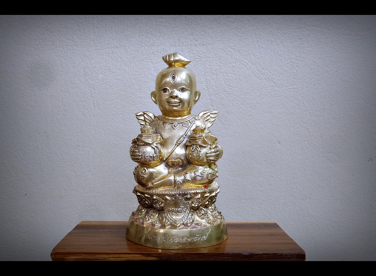 กุมารเทพ บันดาลทรัพย์ สองหน้า เนื้อทองเหลือง - หลวงปู่ครูบาคำเป็ง