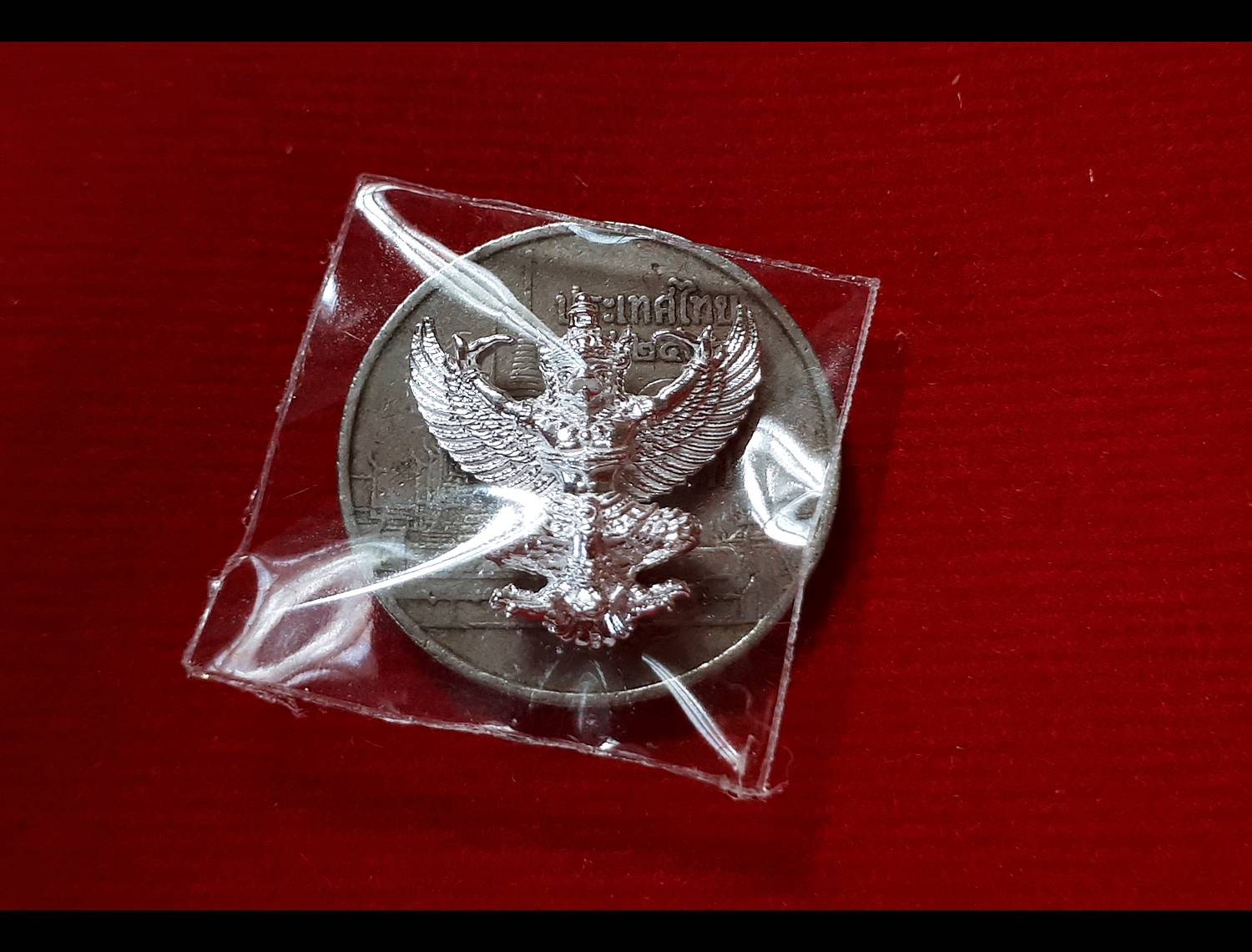 พญาครุฑ เนื้อเงินแท้ (ขนาดเล็กห้อยคอ) ปี2557 (หลวงพ่อรวย หลวงพ่อเพิ่ม หลวงพ่อพูน ร่วมปลุกเสก วัดป่าเลไลย์) #รับประกันแท้