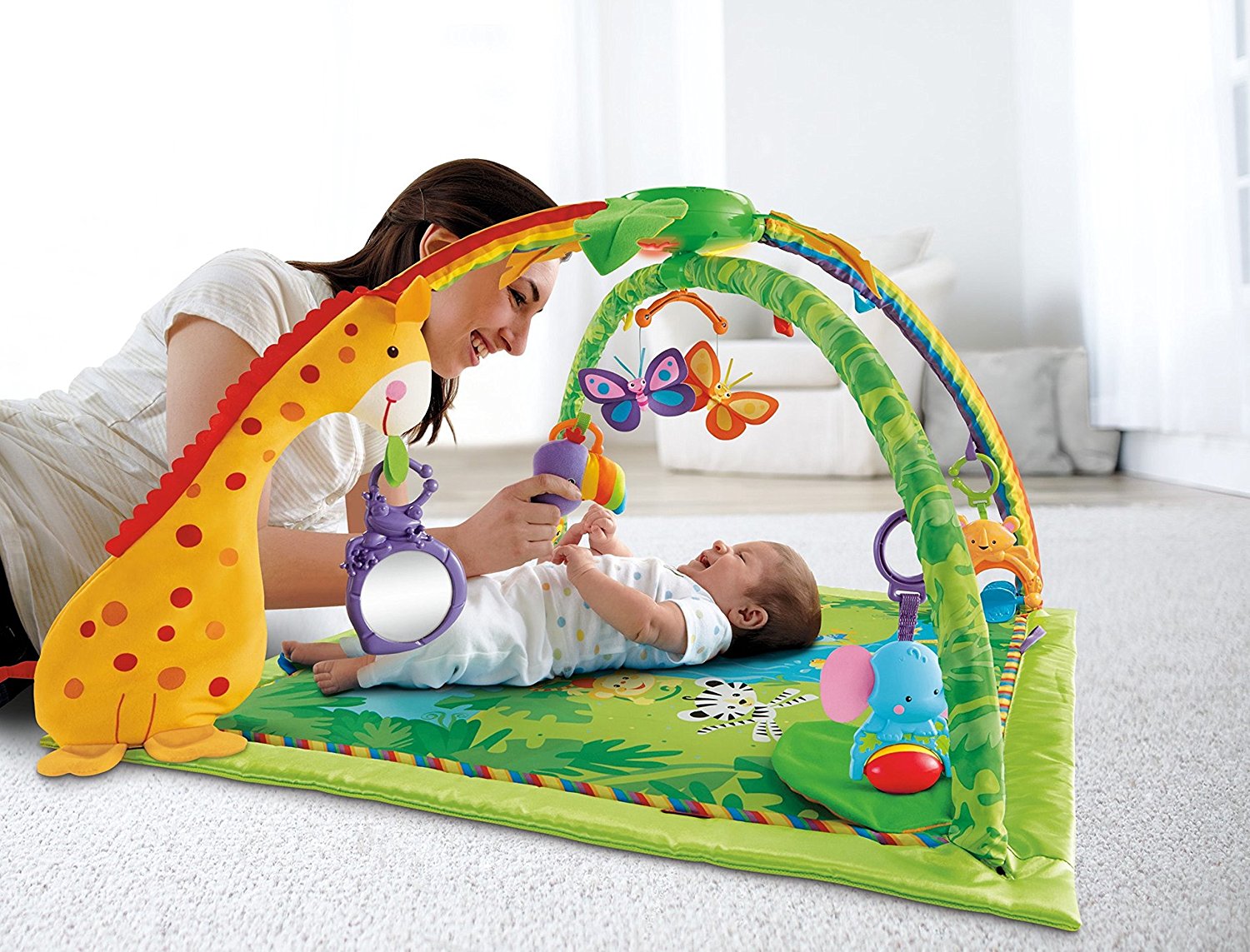 เพลย์ยิมเสริมพัฒนาการ Fisher-Price Rainforest Melodies & Lights Deluxe Gym