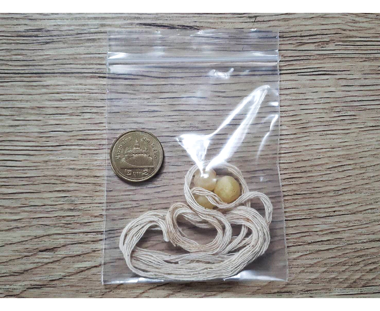 ลูกอมเทียนชัยมงคล สายสิญน์ - หลวงพ่อเล็ก วัดท่าขนุน (อฐิษฐานจิตปลุกเสก ปี2562 ณ วัดบ้านห้วยน้ำขาว)