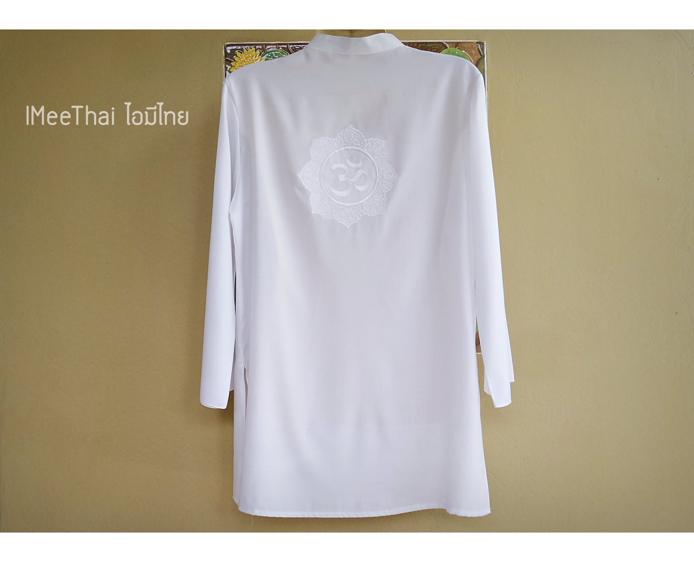 เสื้อขาว อักษรขาว โอมพระพิฆเนศ
