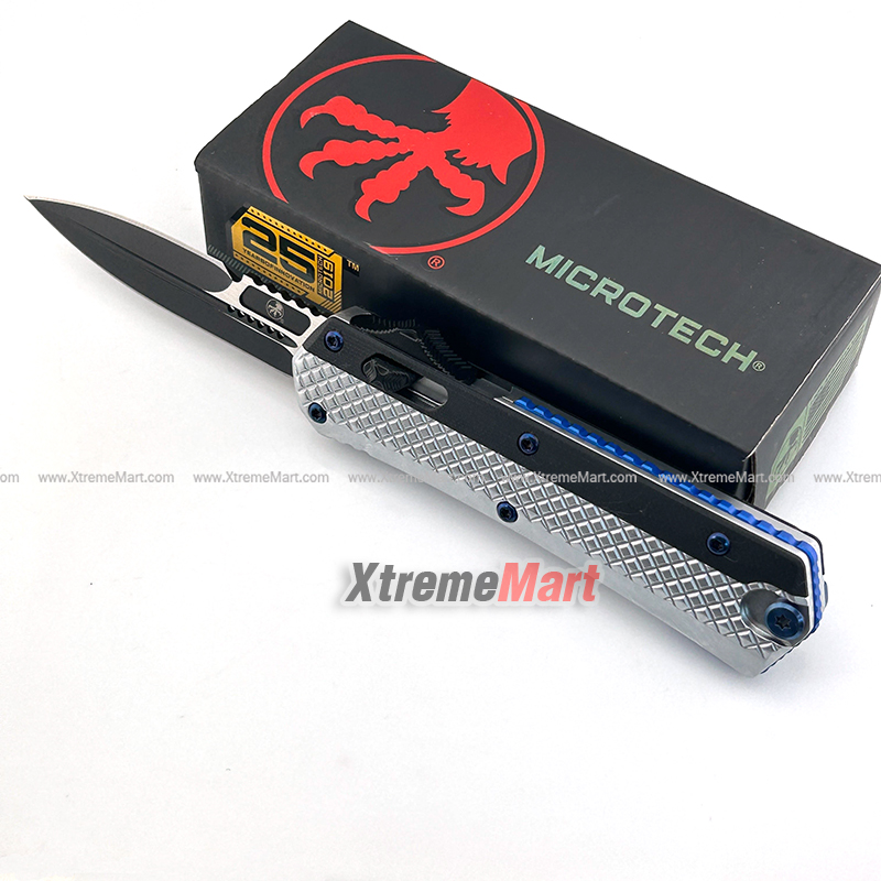 มีดสปริงขนาดใหญ่ Microtech (ด้ามอลูมินั่ม 2-Tone) คม2ด้าน ใบดำ ด้ามเงิน คลิปสีน้ำเงิน Combat Troodon 00556 D/E Automatic Knife