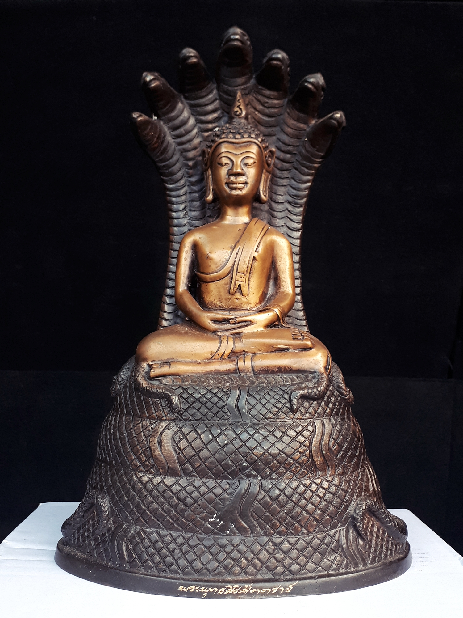 หลวงพ่อเจ็ดกษัตริย์ พระพุทธสิริสัตตราช ( พระบูชา ปางพระนาคปรก ขนาดหน้าตัก 4นิ้ว เนื้อโลหะชนวน รมดำ )