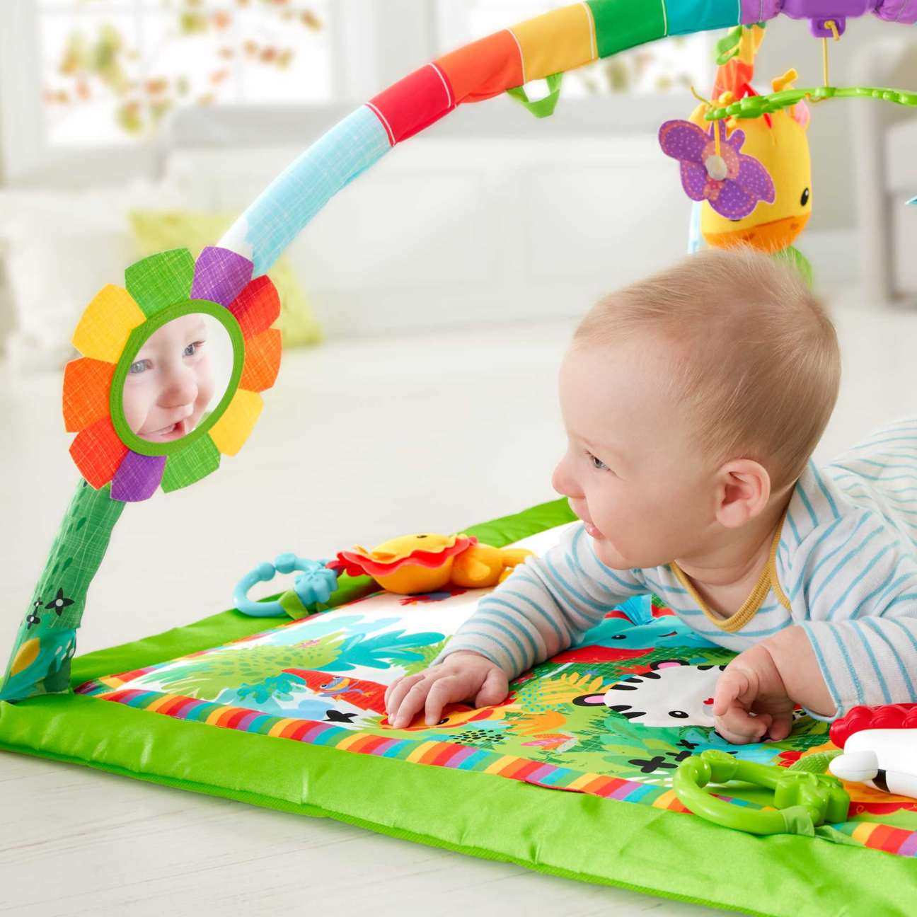 เพลย์ยิมเสริมพัฒนาการ Fisher-Price Rainforest Music & Lights Deluxe Gym