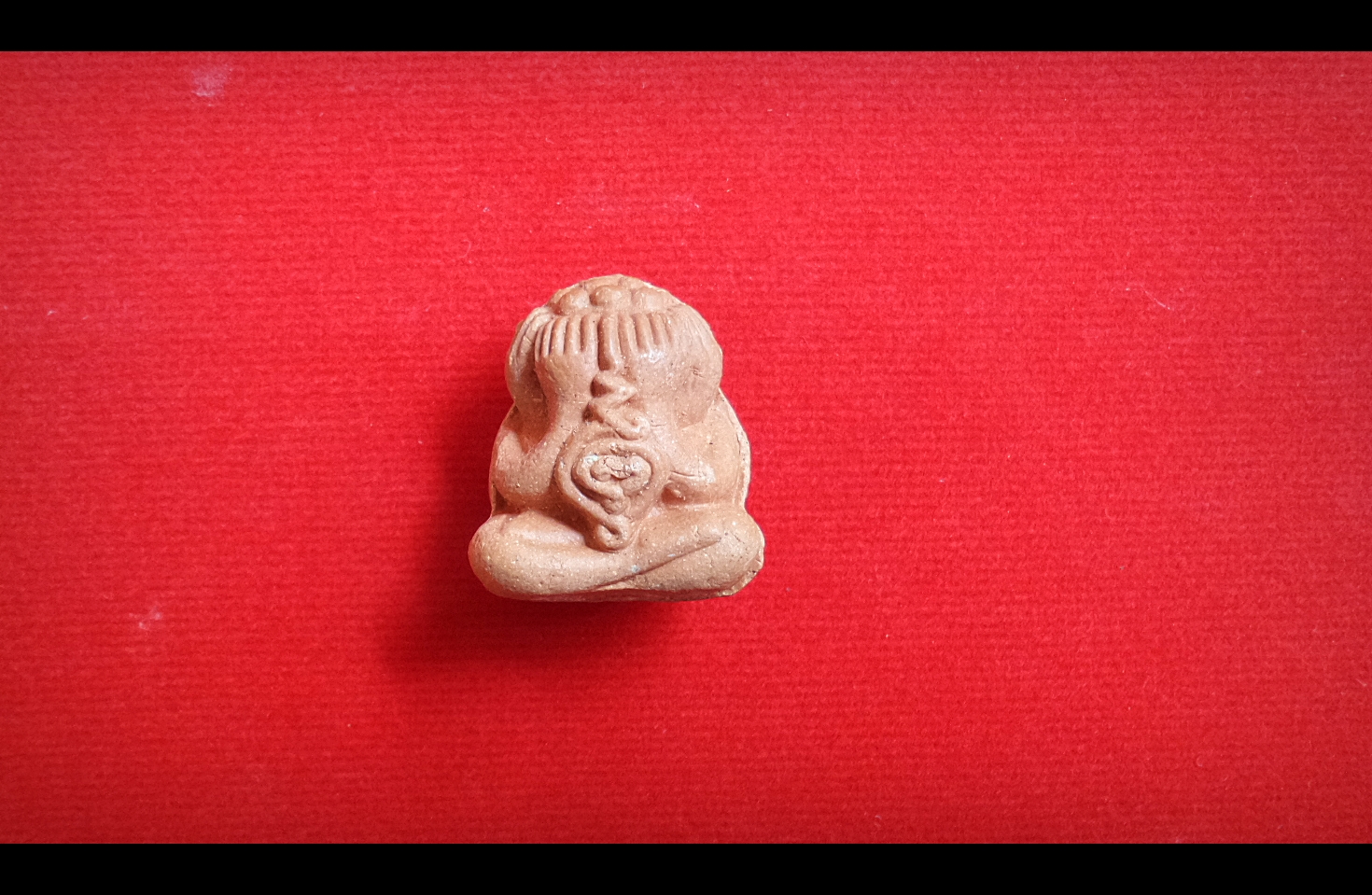 พระปิดตา เนื้อผงชมพูนุช ก้นอุดเทียนชัย ปี2543 - หลวงปู่หมุน (ออกวัดซับลำใย จ.ลพบุรี)