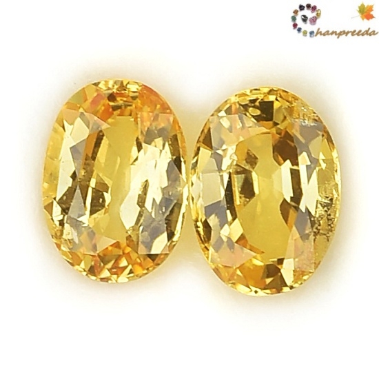 Yellow Sapphire พลอยบุษราคัมเนื้อแข็ง รูปไข่คู่ น้ำหนักรวม 2.22 กะรัต สีเหลืองทอง เนื้อสะอาดมองตาเปล่าไม่มีตำหนิ