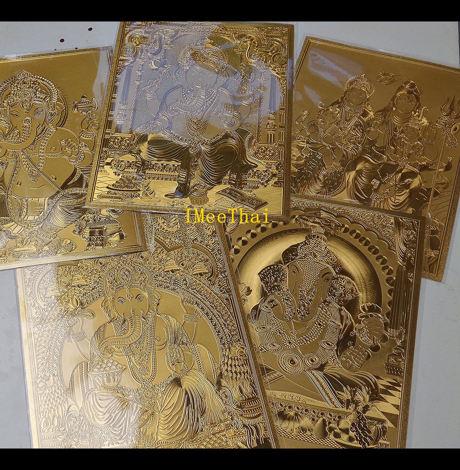 รูปภาพแผ่นทอง พระพิฆเนศ พระศิวะ พระแม่อุมา พระแม่กาลี ปางต่างๆ แผ่นทองพิมพ์ลายนูน 2หน้า (ขายปลีก ขายส่ง)