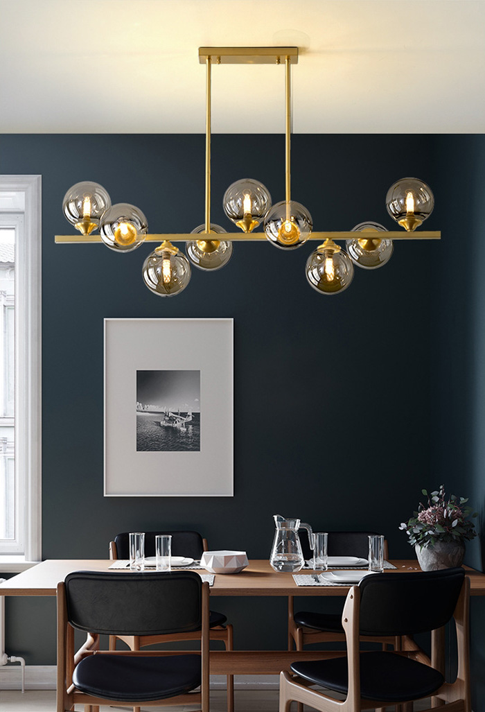 โคมไฟแขวนเพดานสไตล์โมเดิร์นโครงสีทองเหลืองโป๊ะโคมแก้วทรงกลมสีเหลืองใส [JB1438]