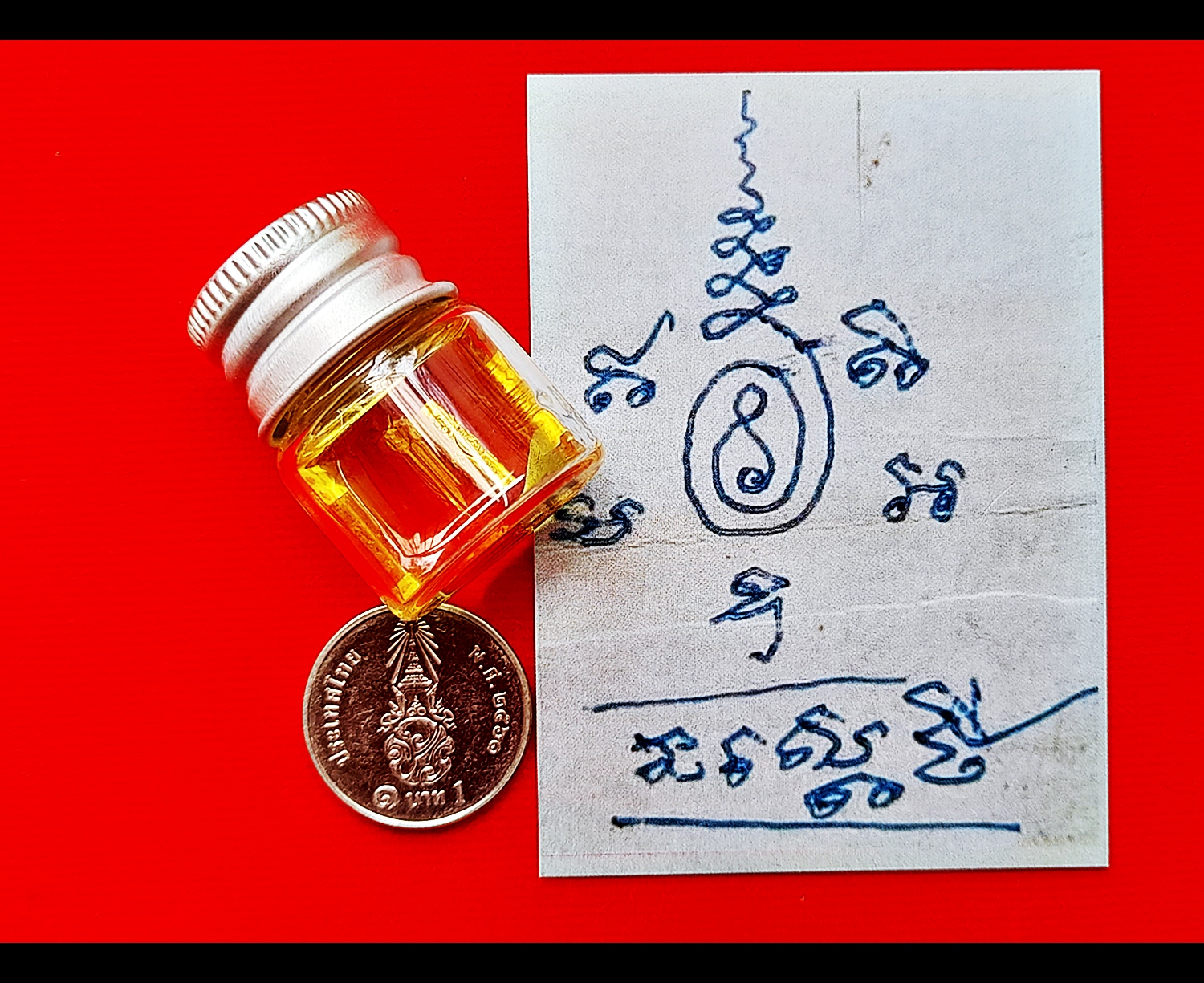 ตะกรุดยันต์นะเศรษฐี(มหาลาภ)(ตำหรับหลวงพ่อกวย วัดโฆสิตาราม) ดอกเล็ก เนื้อทองเหลือง แช่น้ำมันจันทร์ ปี2564