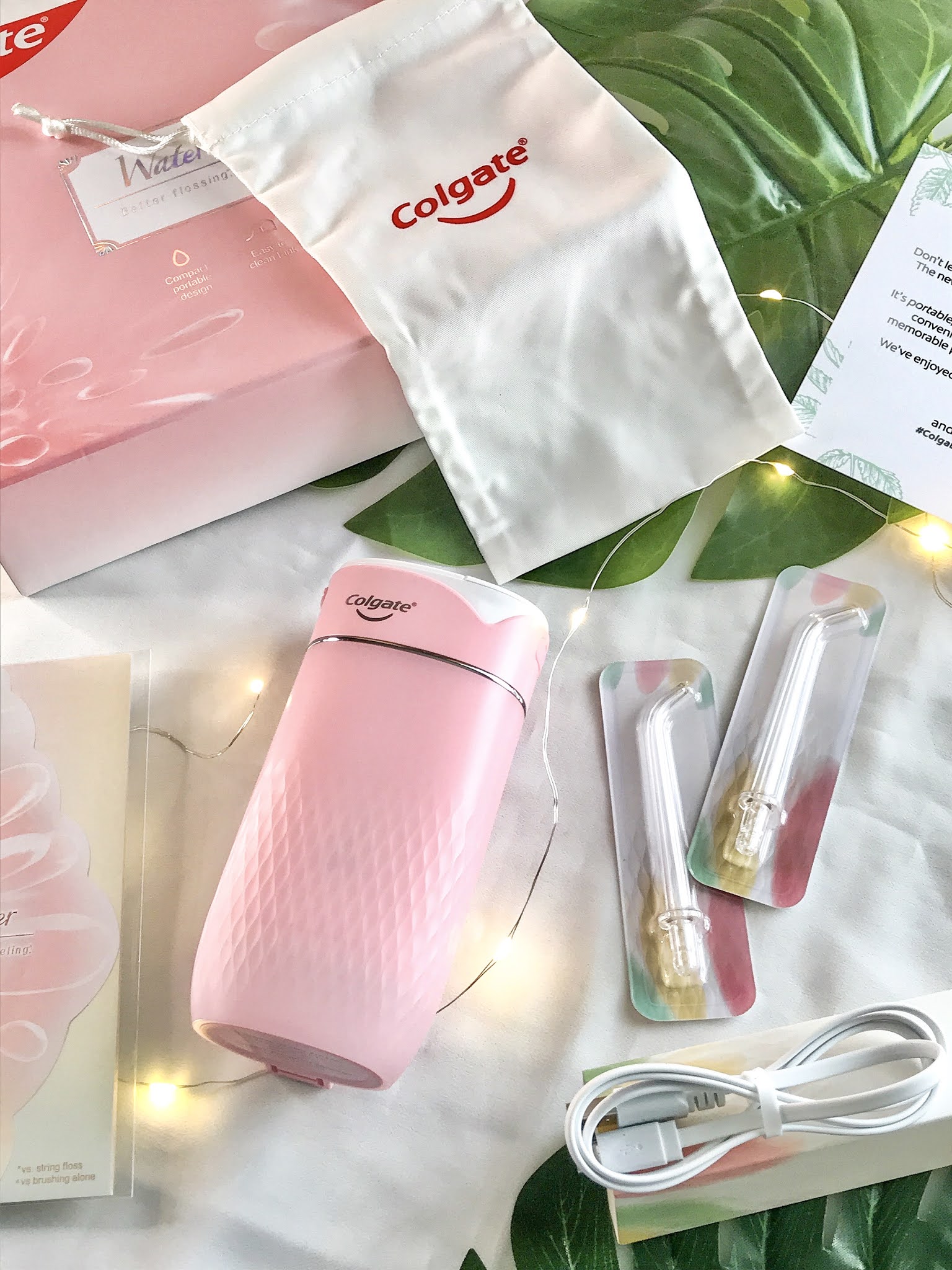 Colgate Water Flosser คอลเกต ไหมขัดฟันพลังน้ำ พกพาสะดวก เครื่องพ่นน้ำทำความสะอาดซอกฟัน ใช้งานง่ายและให้ความรู้สึกสะอาดล้ำลึก