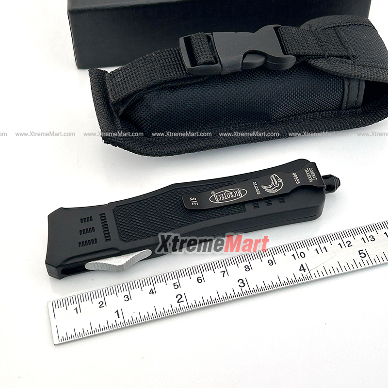 มีดสปริงตรง Microtech ขนาดกลาง ใบ Tanto คมด้านเดียว กึ่งหยัก Combat Troodon 00556 D/E Automatic Knife Camping Tool