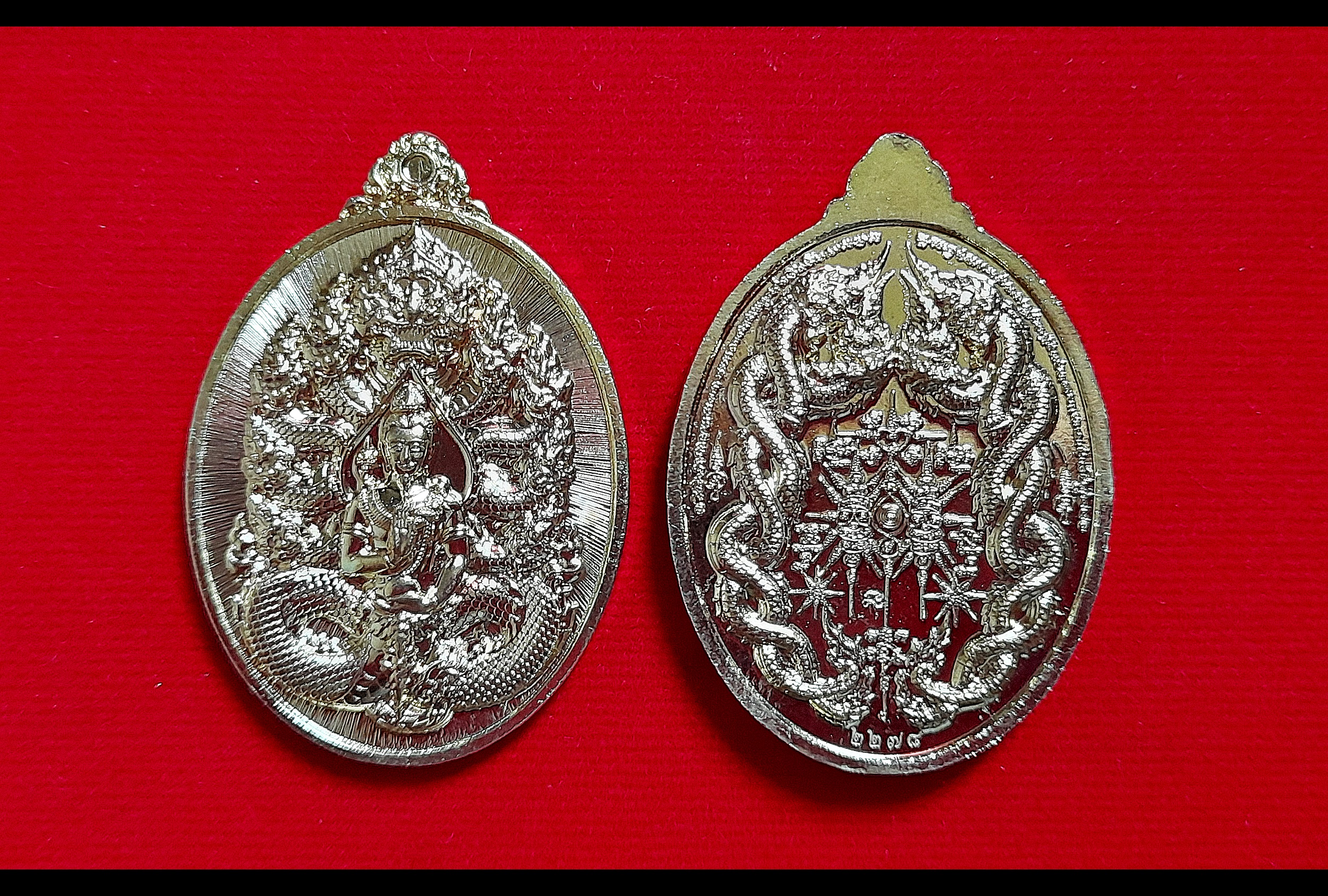 เหรียญ พญานาคราช๙เศียร หลัง นาคเกี้ยว (เก้าอธิบดี พญานาค ทั้ง๙ตระกูล) เนื้อปลอกลูกกระสุนปืน ปี2565 #รับประกันแท้