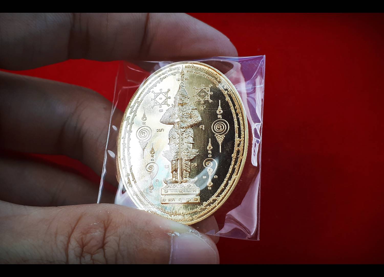 เหรียญรอยพระพุทธบาท หลังท้าวเวสสุวรรณ เนื้อทองทิพย์ ปี2561 - หลวงพ่อเล็ก วัดท่าขนุน