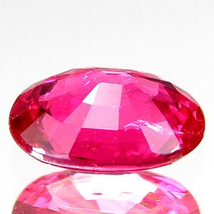 ทับทิม Ruby รูปไข่ 1.16 กะรัต ขนาด 5.6x7.3x2.9 มิล สีแดงอมชมพูบานเย็น เนื้อสะอาด 80-85% ขึ้นไป รูปร่างสวย เจียระไนสวย จากโมซัมบิค (เผาธรรมชาติ) TGL