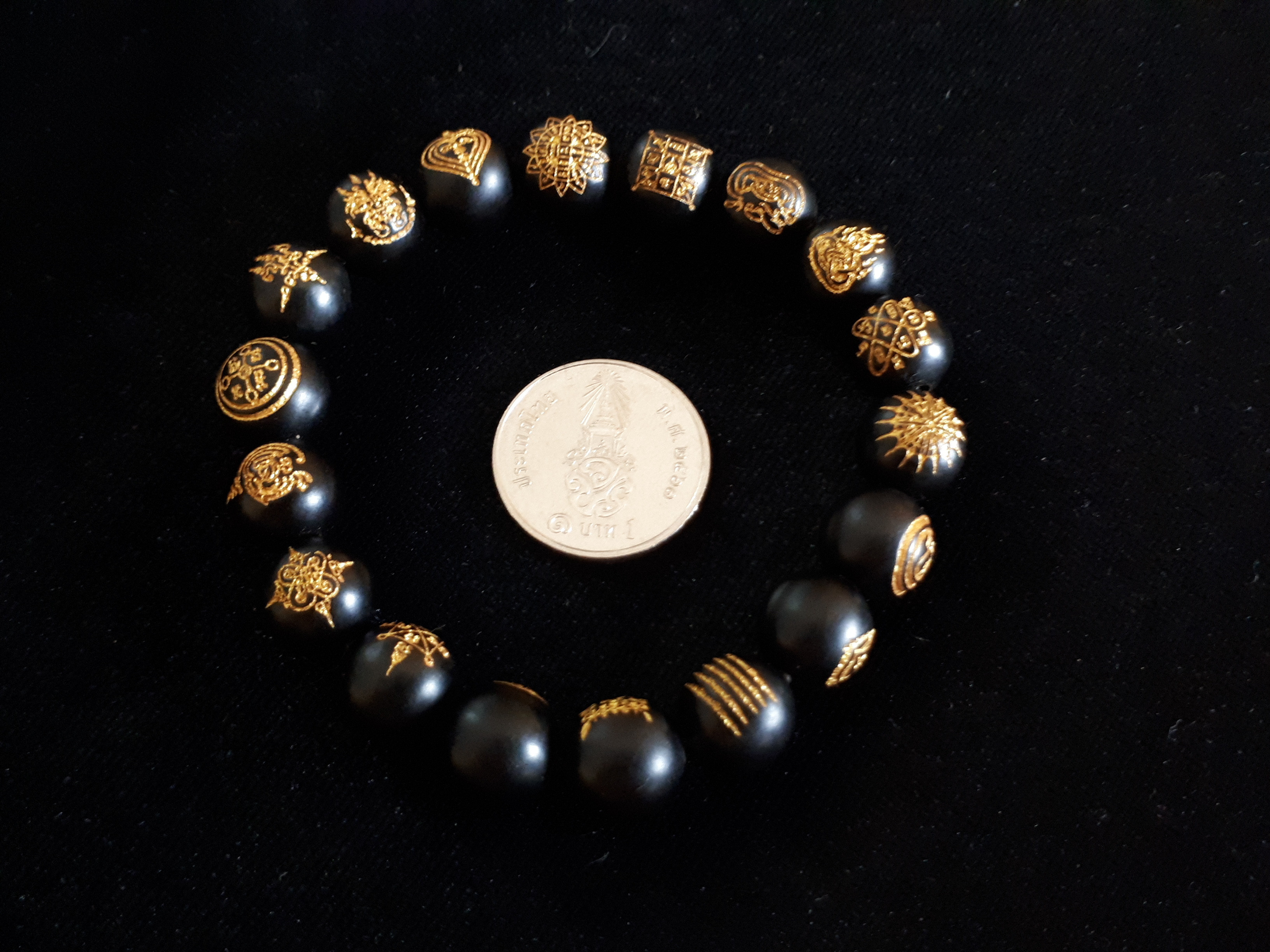 ประคำข้อมือ ไม้พญางิ้วดำแท้ (ยิงต์เลเซอร์ลายยันต์)