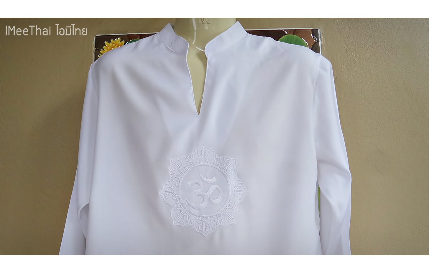 เสื้อขาว อักษรขาว โอมพระพิฆเนศ
