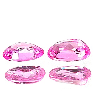 Pink Sapphire พิงค์ซัฟฟราย พลอยเนื้อแข็งสีชมพู รูปไข่คู่ หนักรวม 2.15 กะรัตสีชมพูหวาน สีเบอร์3มองตาเปล่าความสะอาด 99% ส่องด้วยกล้องขยายจะมีฟอง