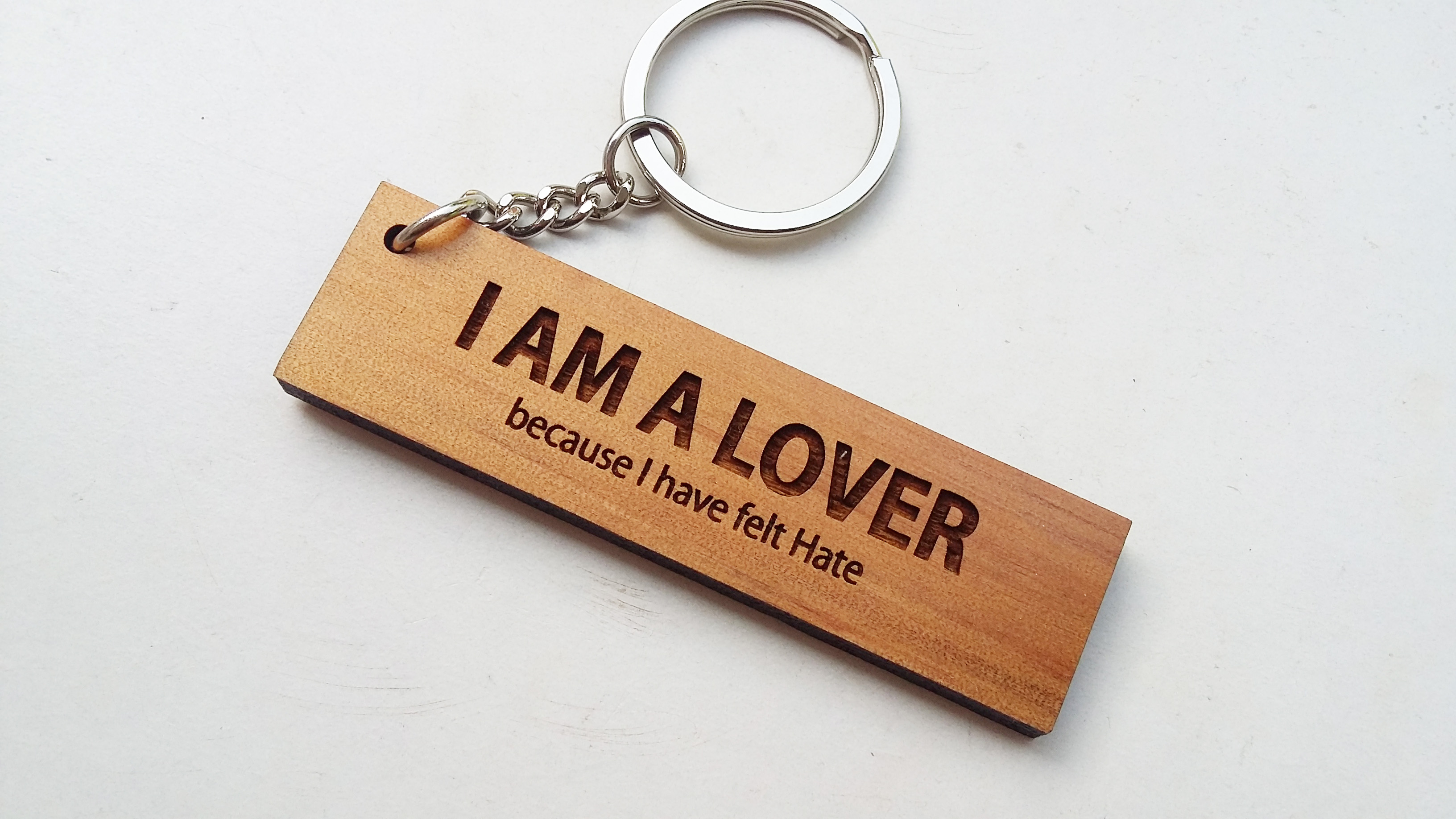 พวงกุญแจไม้ พวงกุญแจไม้ใส่ข้อความ - I AM A LOVER because I have felt hate