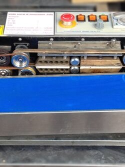 เครื่องซีลปากถุง แบบสายพานต่อเนื่อง