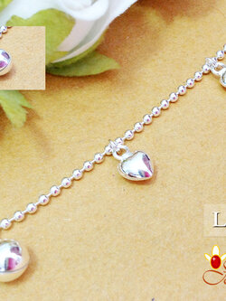 สร้อยข้อเท้าเงินแท้ ห้อยตุ้งติ้งหัวใจเกลี้ยง (พร้อมกระดิ่งตรงตะขอ 1 ลูก) 1.2 มิล