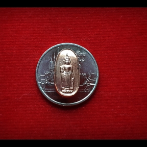 เหรียญเม็ดแตง (ขนาดเล็กจิ๋ว) หลวงพ่อธรรมจักร วัดธรรมามูล (พระพุทธรูป ปางห้ามญาติ)