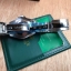 นาฬิกา Rolex รุ่น GMT Master II สีเงิน กรอบเซรามิค ดำ สายเลสสีเงิน หน้าปัดสีขาว งาน Mirror Swiss