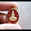 เหรียญหลวงพ่อทอง วัดเขาตะเครา (ทรงวงรี ทรงไข่) เนื้อกระไหล่ทอง ลงยาสีแดง